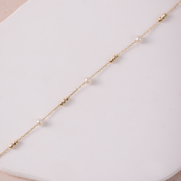 Bransoletka złota z kuleczkami i perłami - 585