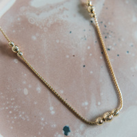 Naszyjnik  złoty kuleczki diamentowane trójki  -  585