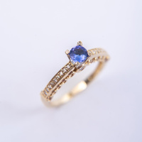  Pierścionek z tanzanitem i brylantami  0.30 ct 