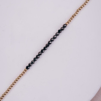 Bransoletka złota z kuleczkami i czarnymi cyrkoniami - 585