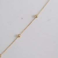 Bransoletka złota z diamentowanymi kuleczkami - 585