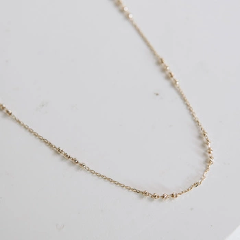 Naszyjnik złoty - delikatne kuleczki diamentowane 585