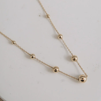 Naszyjnik złoty - kuleczki w różnych wielkościach 585